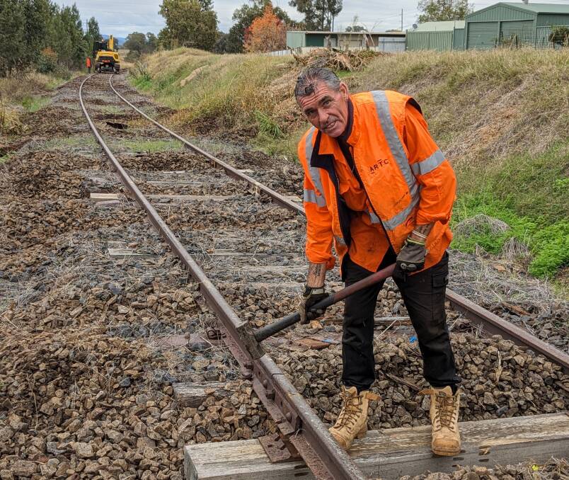 Richard Brown of the Australian Rail Track Corporation removing sleepers one by one - Photo Dan Ryan