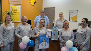 Cowra Commonwealth Bank staff showing their support for the Pyjama Foundation.