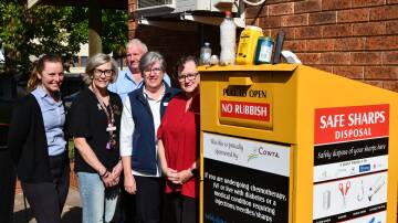 Philippa Childs, Fran Stead, Anthony Collins, Pauline Rowston, and Jennifer Richmond with the new sharpies bin at Squire Park. Image Cowra Council 