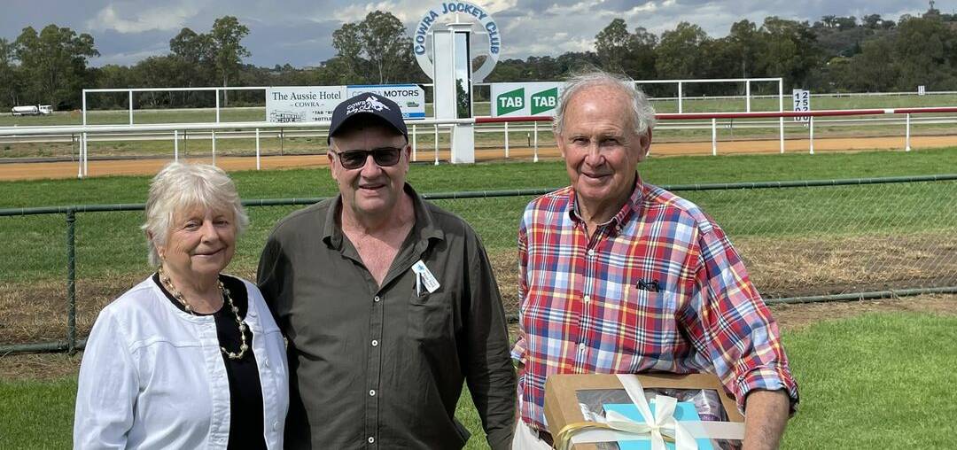 Cowra Jockey Club president Peter Ford with Di and David Paton at last Saturday's race meeting, David's final as a member of the Cowra Jockey Club committee and as club veterinarian.